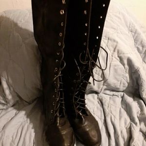 Black leather knee high boots
